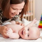 What can my 2-month old baby see? Mother and baby playing